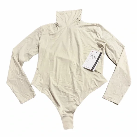 NWT Lululemon Wundermost Ultra-Soft Nulu Turtleneck Bodysuit (Bone) Size Large - Picture 1 of 7